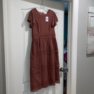 Woman's mauve Bohme dress size L.  Beautiful lace dress and fully lined.  New